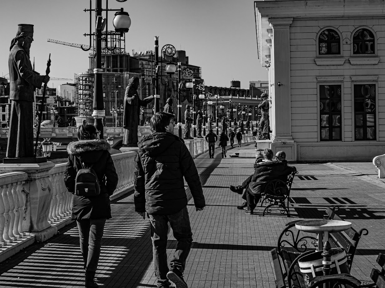 Photo of people walking in the city